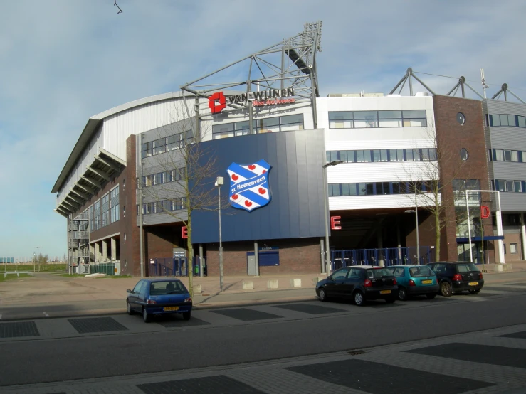 a large stadium building that is being used for soccer