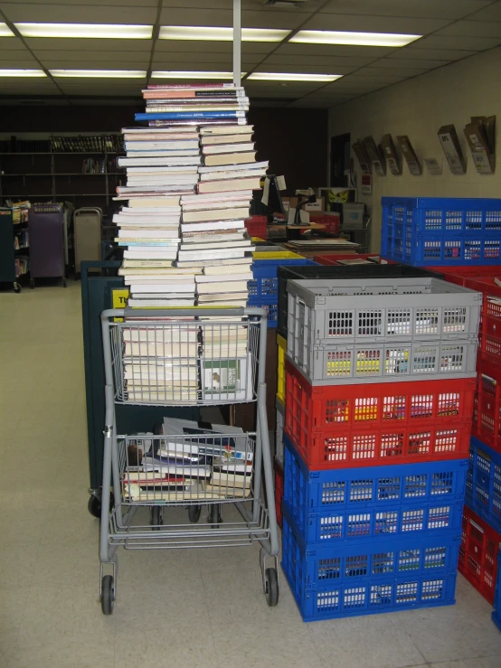 a shopping cart full of papers in an office area