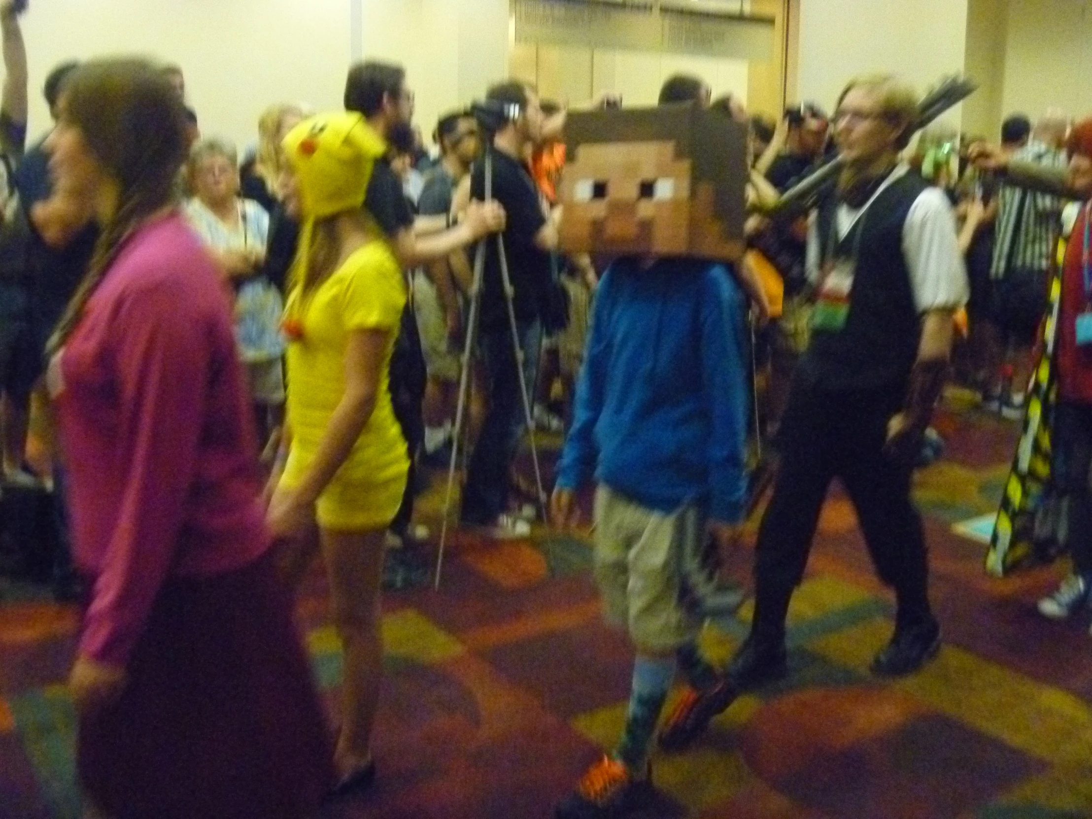people standing on the floor and dressed in costume
