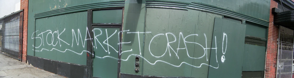 graffiti is written on the wall next to a doorway