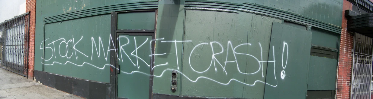 graffiti is written on the wall next to a doorway