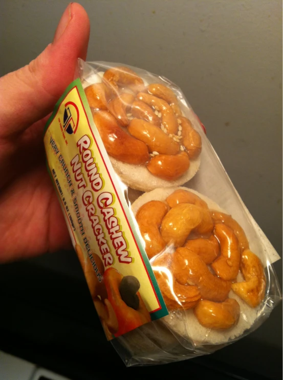 there is a close up of two small donuts in the package