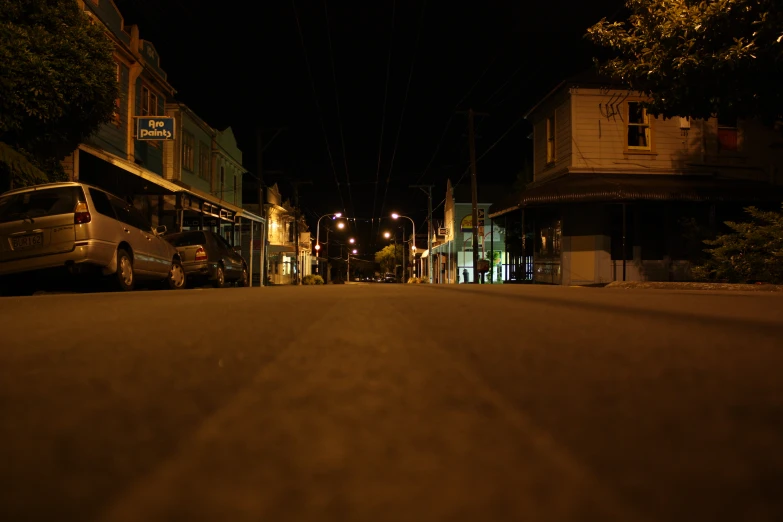 a car and bus parked on the side of a street