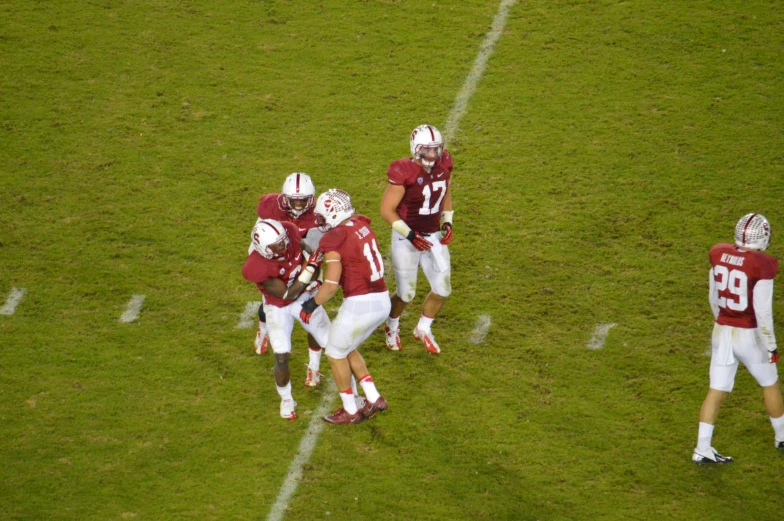 a group of players walking onto the field together