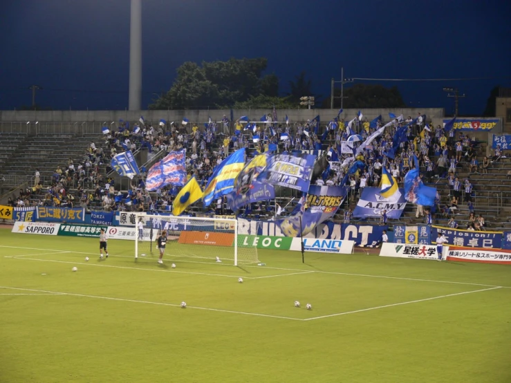 a stadium full of people on a soccer field