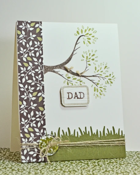 a handmade card with tree nch and words