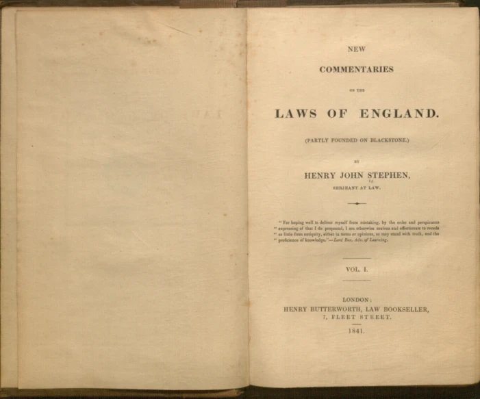 a book open to a page showing the laws of england