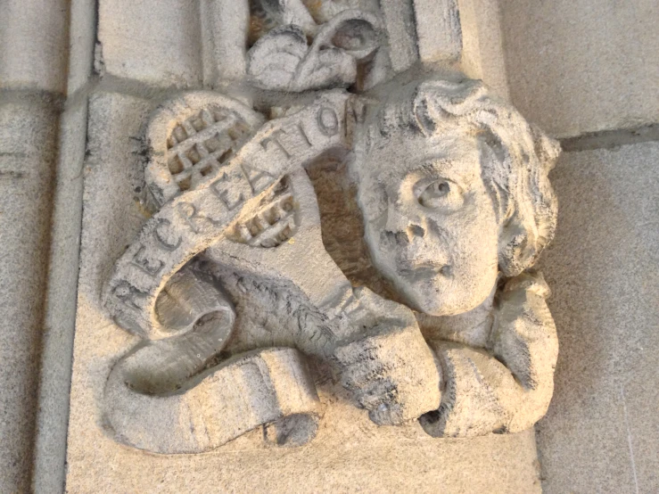 a stone sculpture in the shape of an elephant on a building