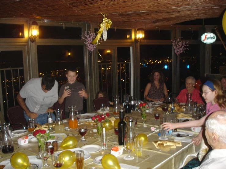 an image of a group of people celeting a party