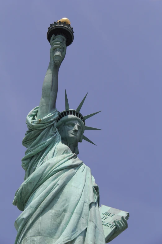 the statue of liberty has a torch in its hand