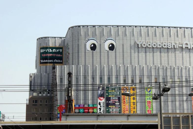 a gray building with a large smile on the face