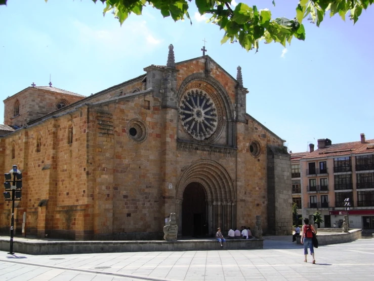 an image of a building that looks like it has a clock on the front