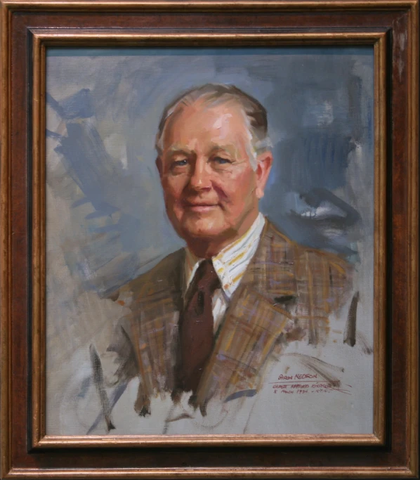 a portrait of a man wearing a suit and tie