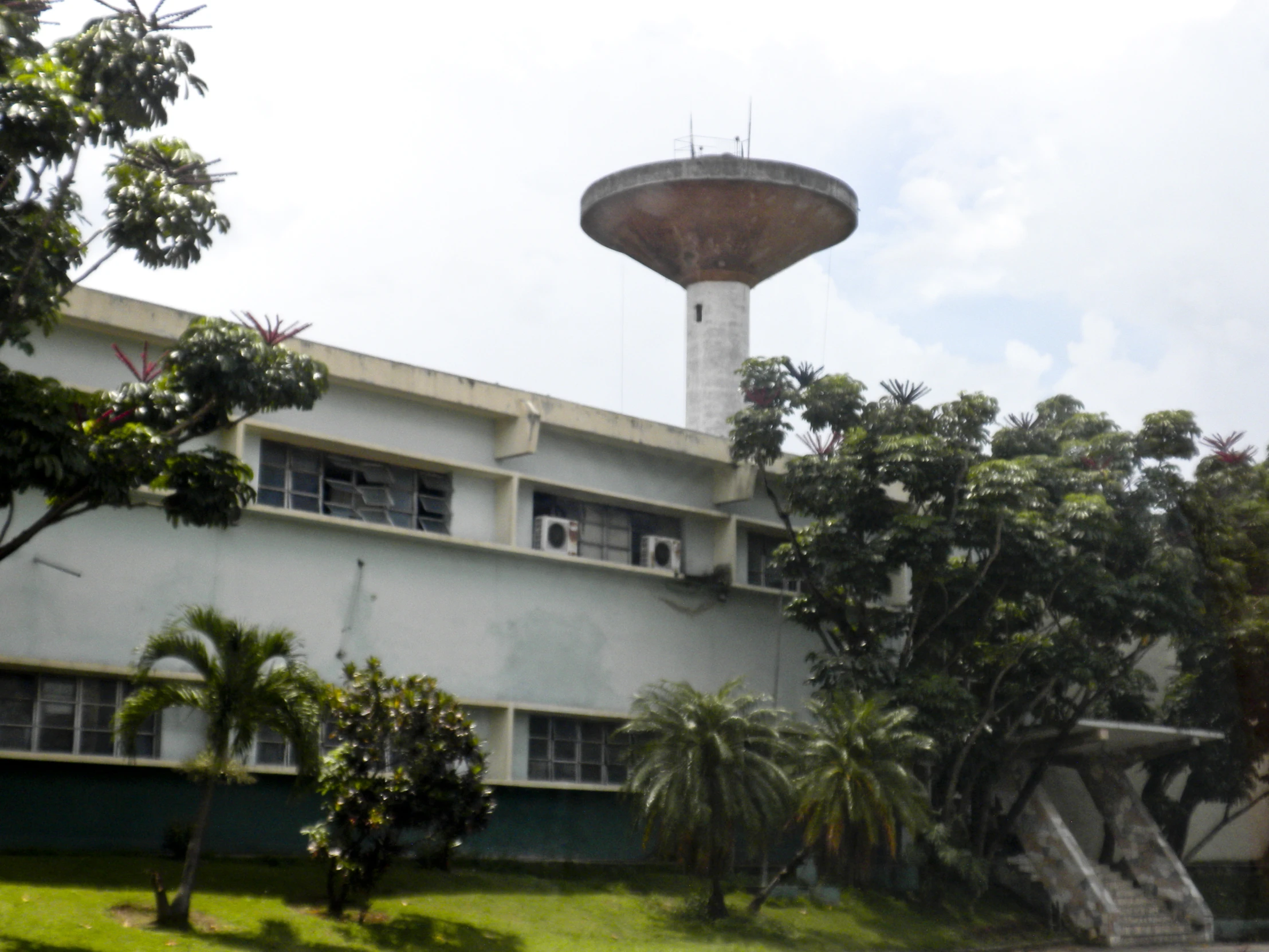 a tall building with a clock tower on top