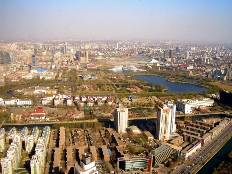 an aerial view of city skylines and river