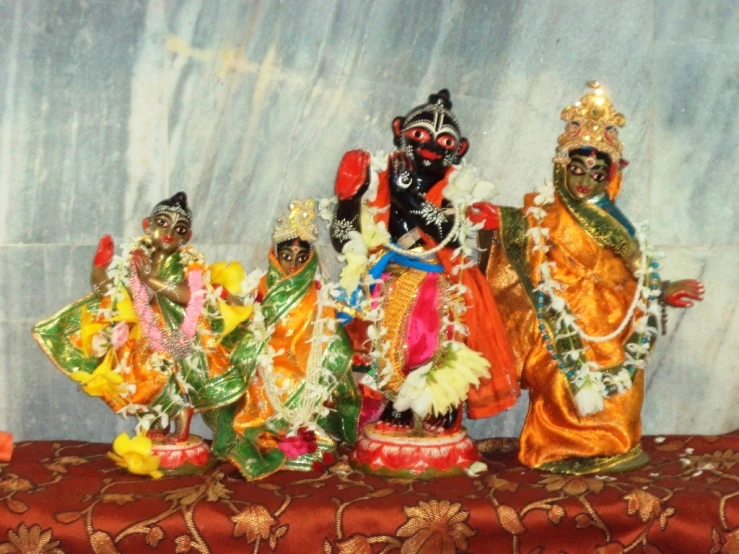 a group of figurines sitting on top of a table