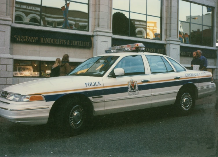 a police car that is parked on the street