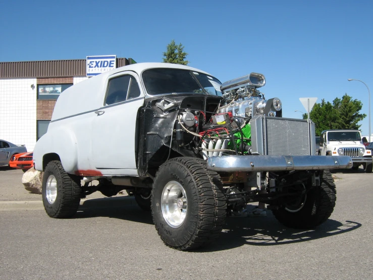 a flatbed truck with an engine in the back