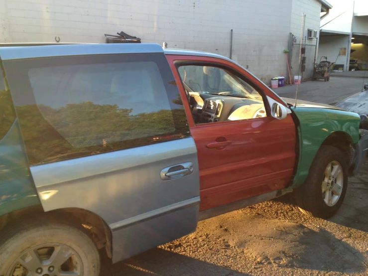 the red and green truck has a flatbed