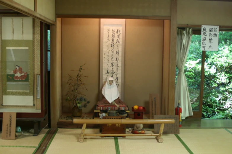 a japanese living room with oriental writing on the wall