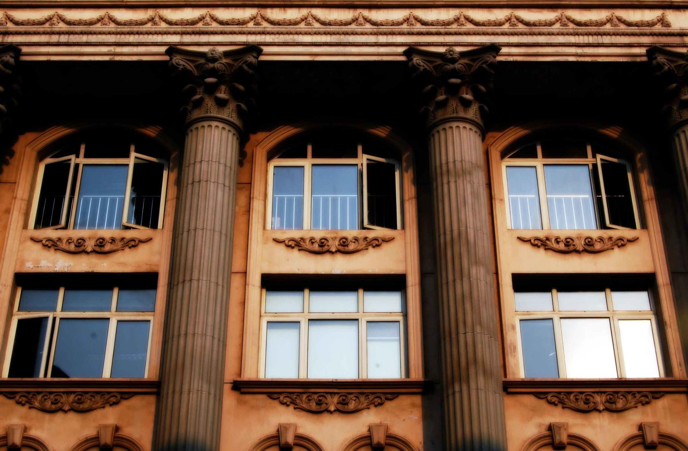 a building with very tall windows on the side