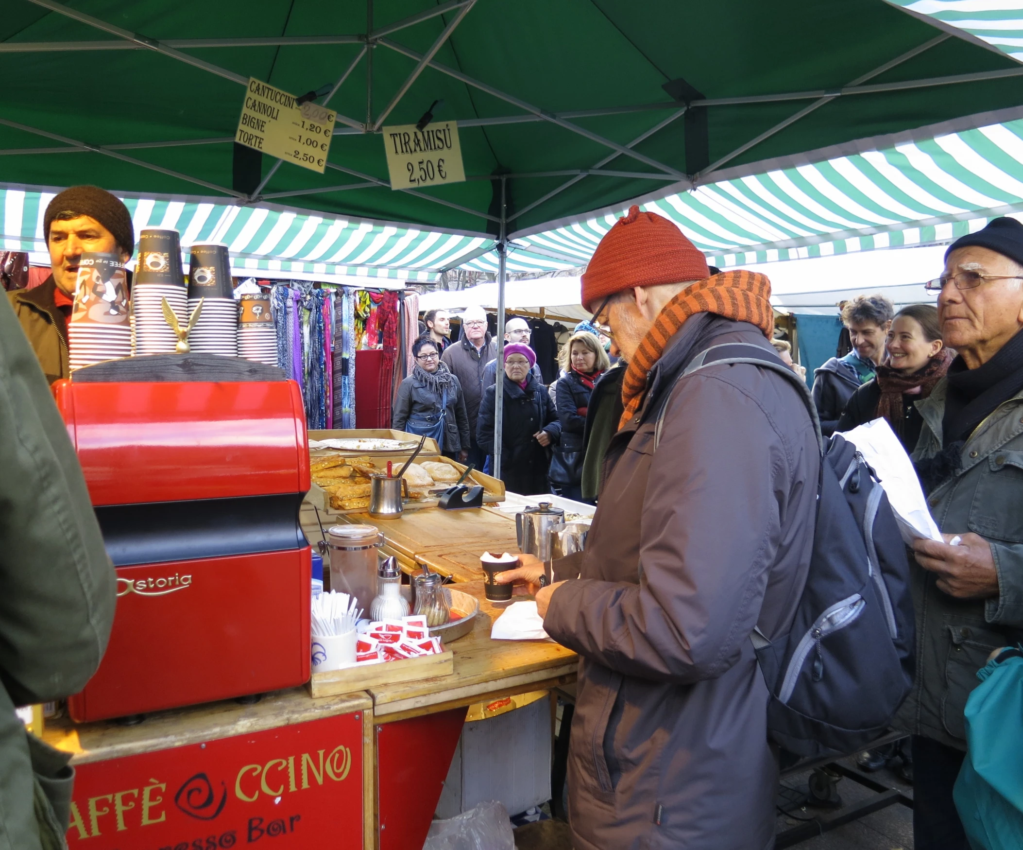 people gathered in a market for food