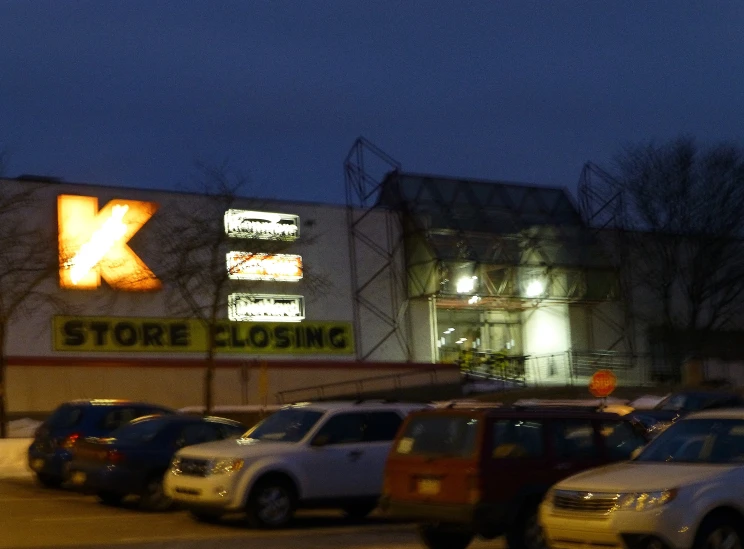 a parking lot with several cars parked on it