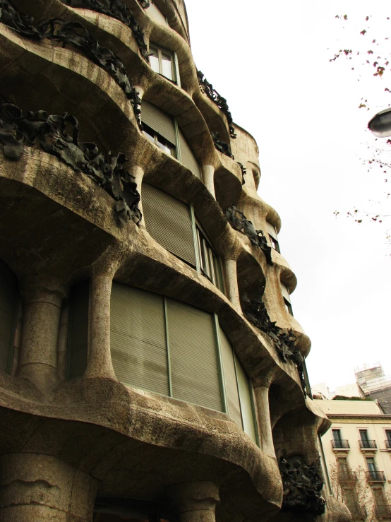 an artistic building with various stone ornaments