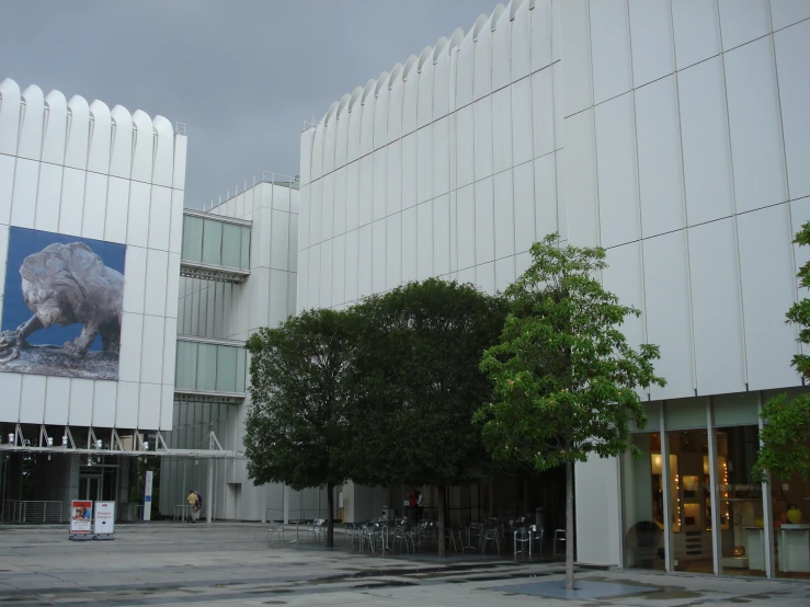 white building with trees and bikes outside