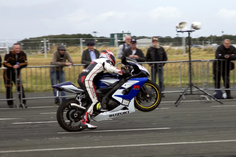 person in the air while on the motorcycle