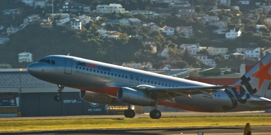 a commercial jetliner taking off from the tarmac