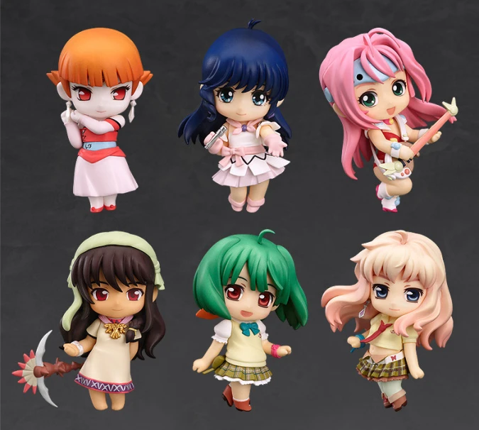 a set of four different little anime girls dolls