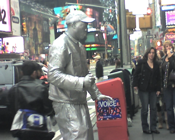 a statue with a microphone in its hand