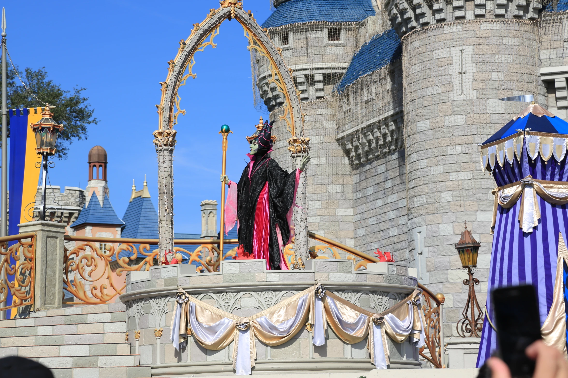 an elaborately designed amut park and castle with giant towers