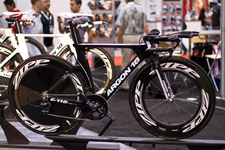 a bicycle parked on display in front of other bikes