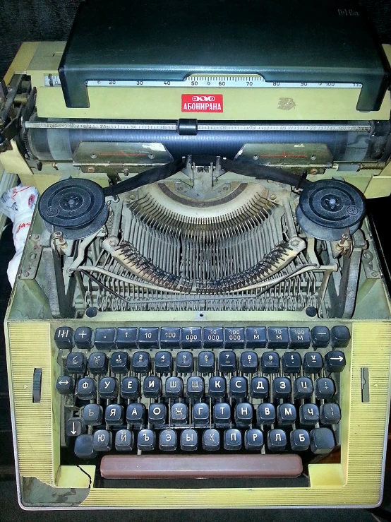 an old fashioned typewriter with an interesting display