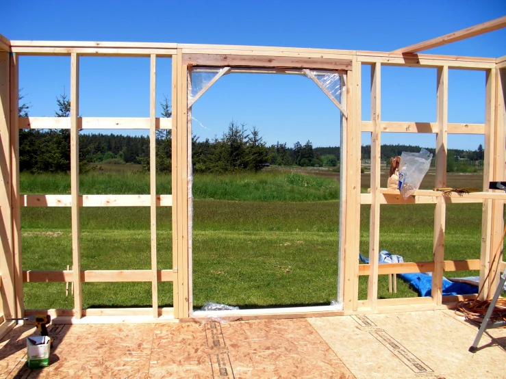 a person with a bag in a room being constructed