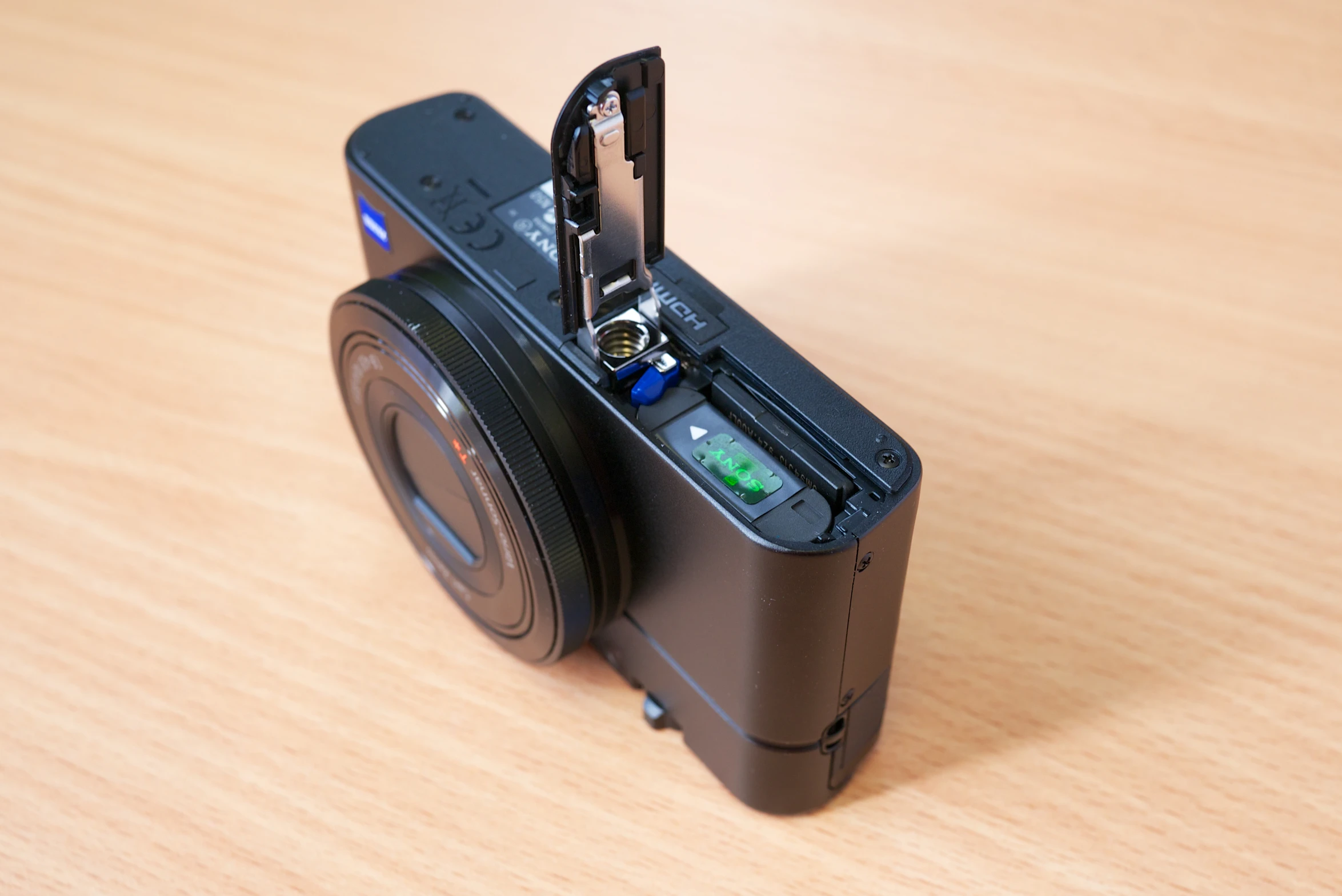 a camera sitting on top of a wooden table