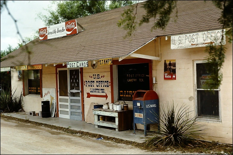 a store called a liquor shop with signs that say its a whiskey bar