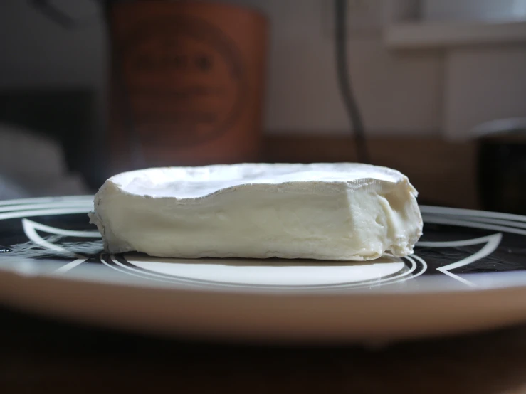 a piece of white cake is on a plate