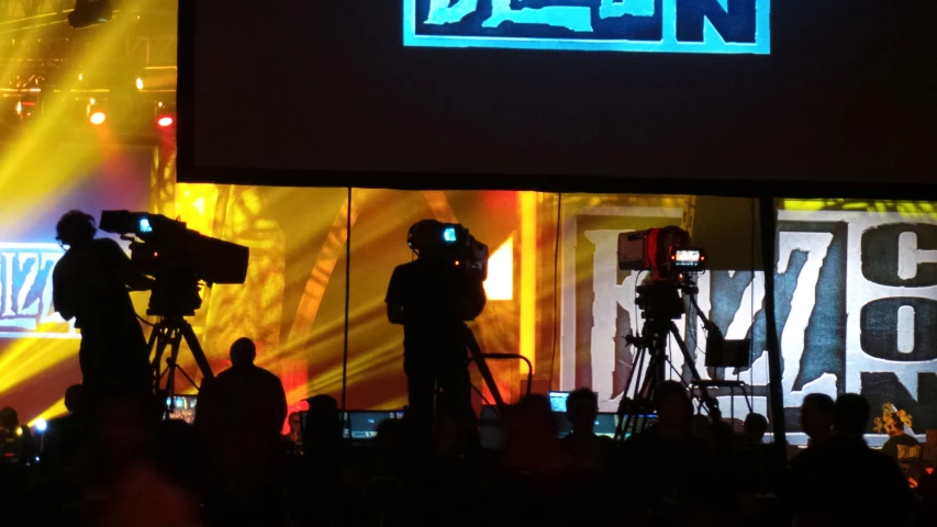 a camera set up on the stage with lights