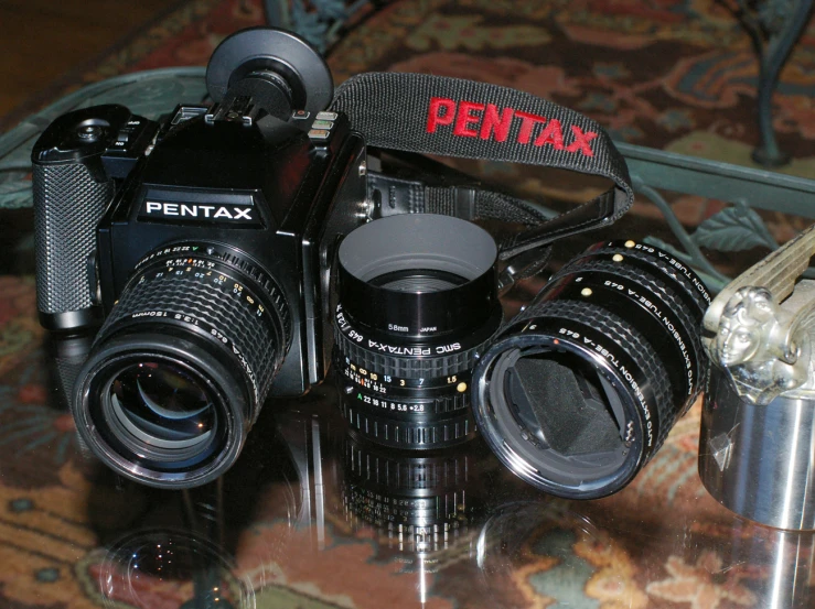 a pentax camera set up on a table
