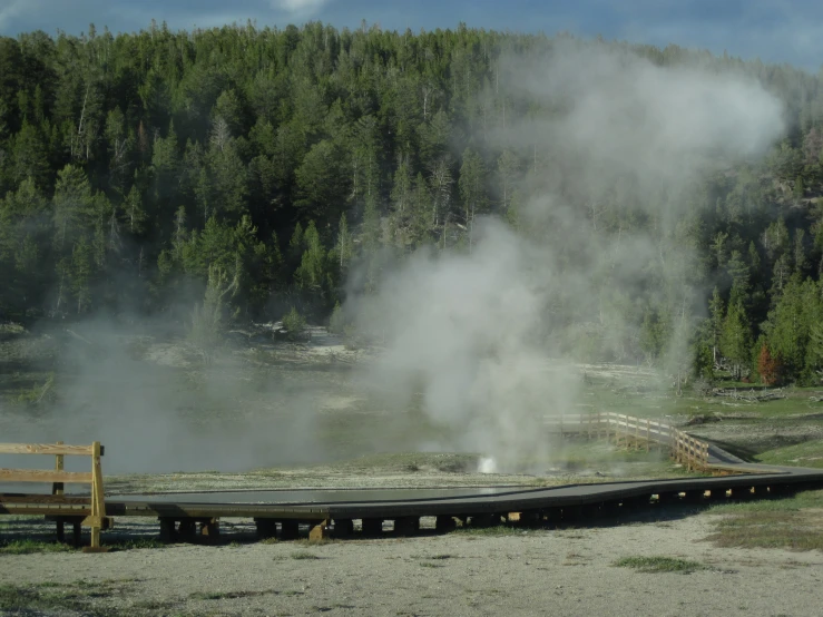 the steam rises on the surface of the lake