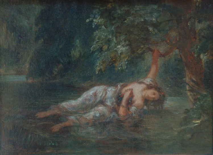 a woman lying in the water while holding her head