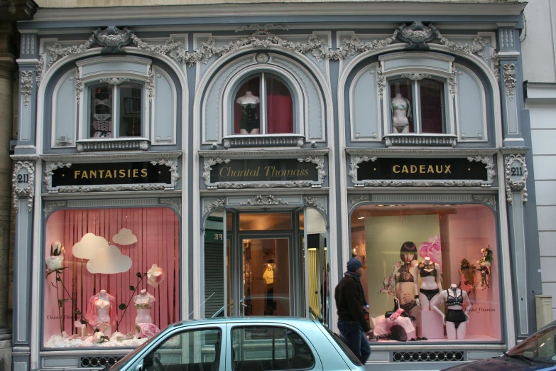 an image of a storefront with many window items on display