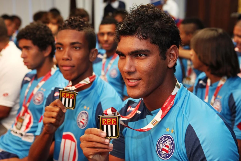 a group of men with medals standing next to each other