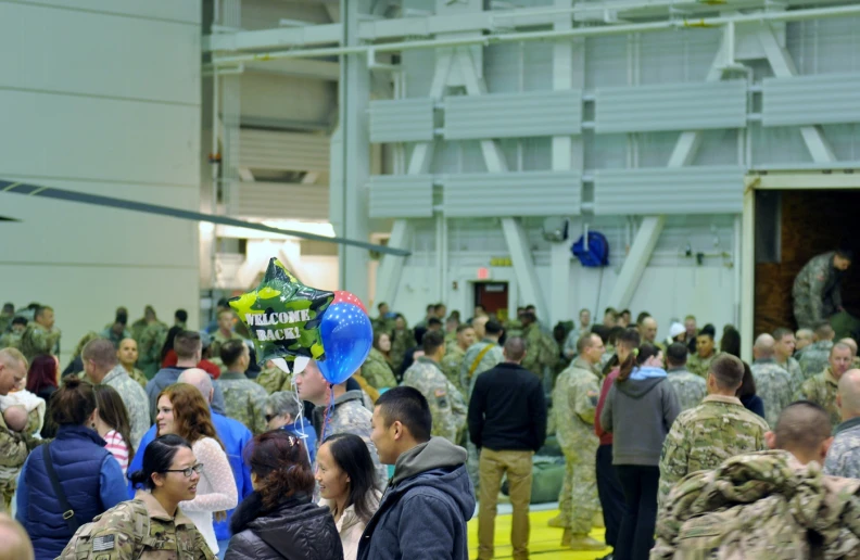 a group of military personnel standing next to each other