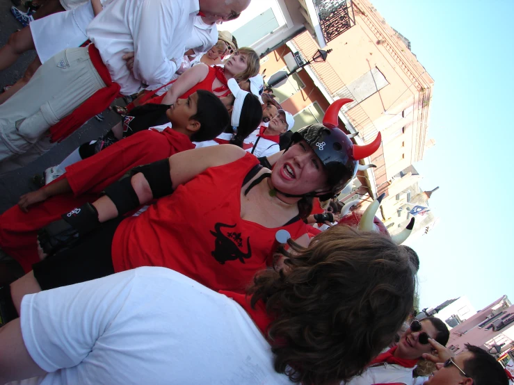 group of people with red and black shirts on