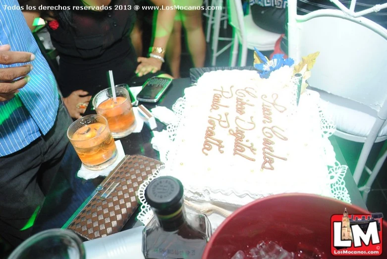 a birthday cake sitting on top of a table