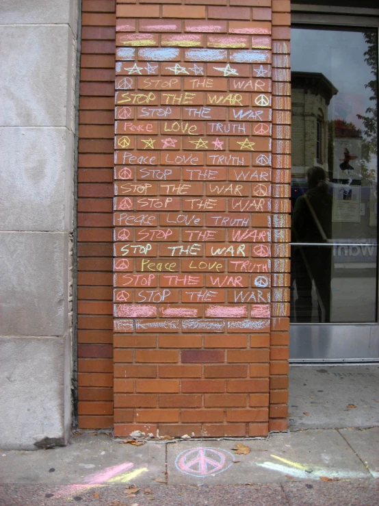 a close up of graffiti written on the side of a building